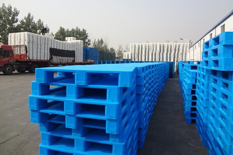 Plastic pallets prepared for export shipping and warehouse logistics